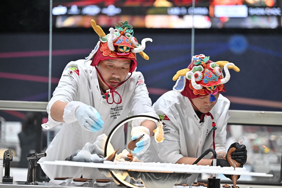 Team China wore festive headwear while working on their desserts.