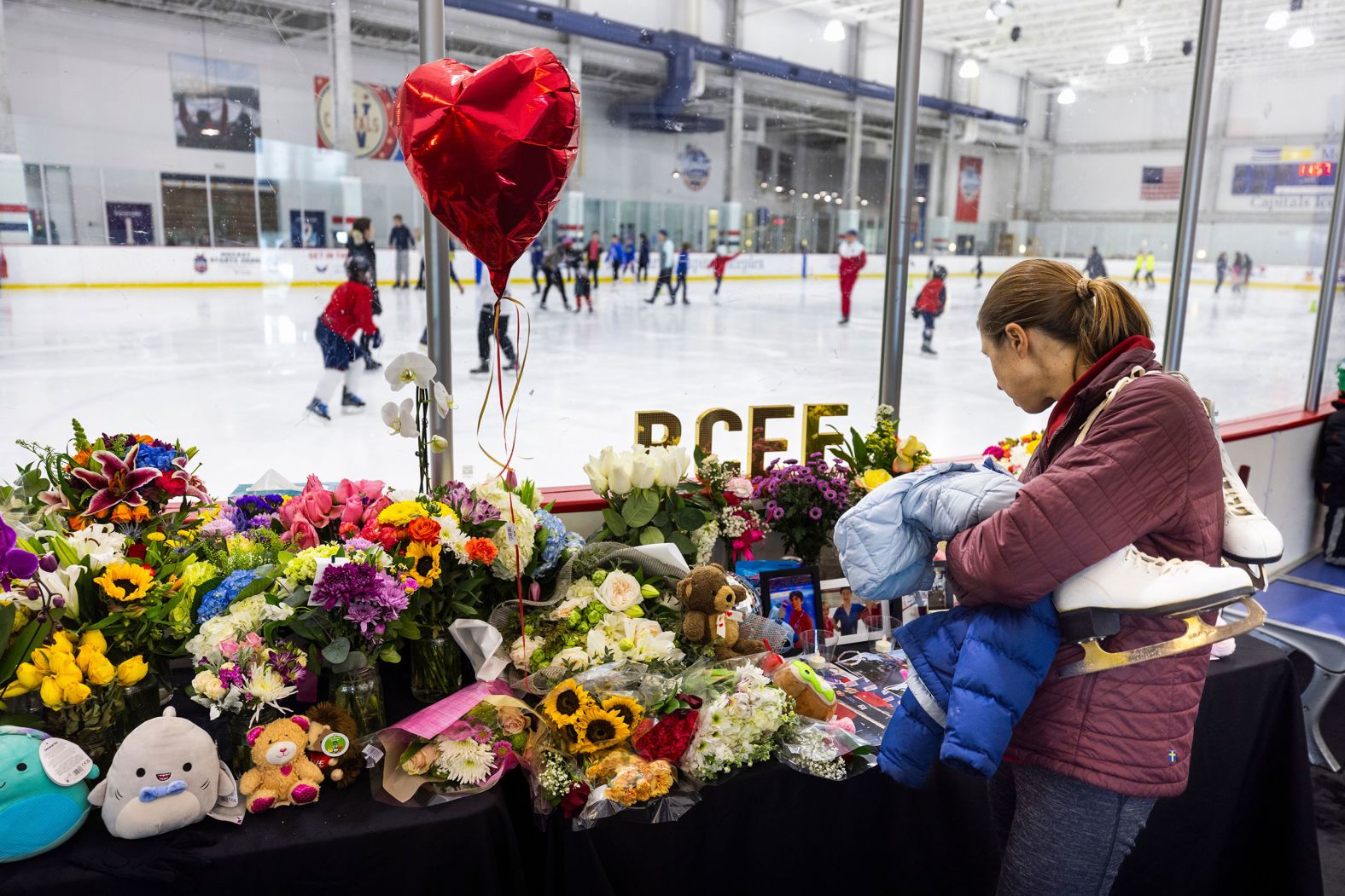 A memorial at the MedStar Capitals Iceplex, in Arlington, Virginia, honors young figure skaters who were killed in the tragedy.