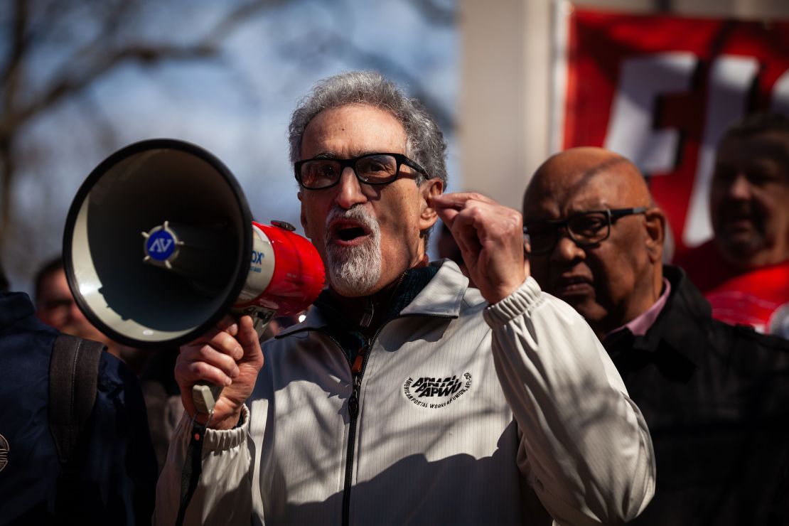 Mark Dimondstein, president of the American Postal Workers Union, speaks at a rally against the Department of Government Efficiency on Monday.