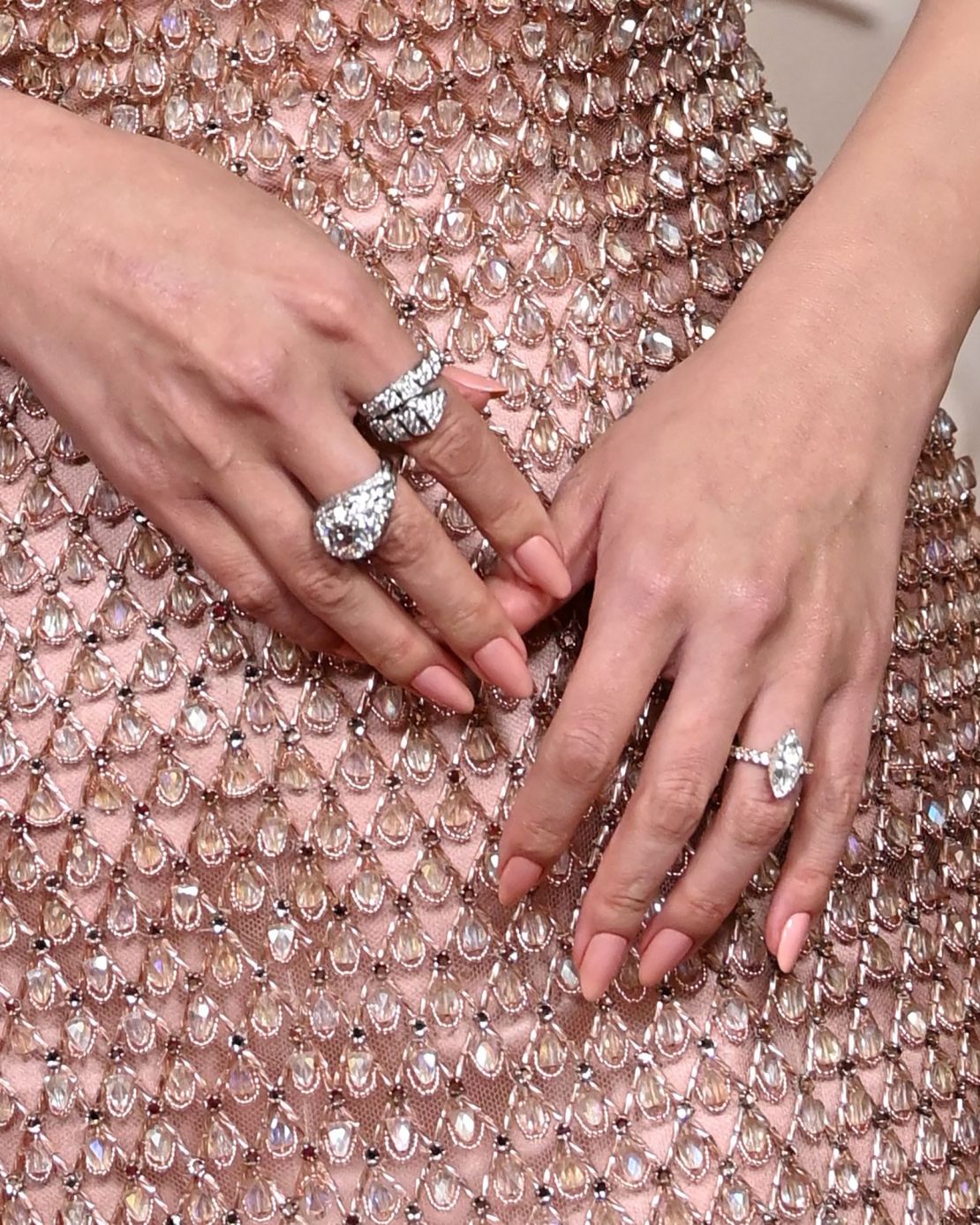 Her gown was embellished with hand-sewn Rosemont crystals and more than 16,000 drops of glass in an intricate lattice work pattern.