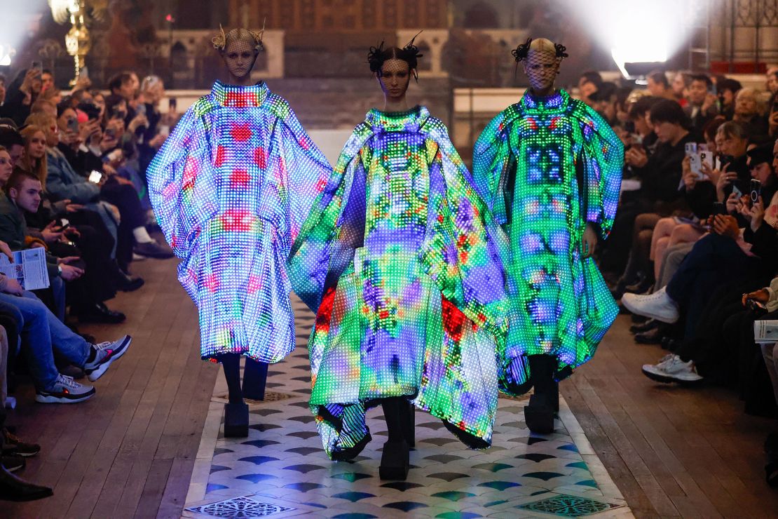 Japanese label Anrealage continued to push the envelope of fashion with technological advancements. This season, poncho dresses were adorned with tiny LED light balls.