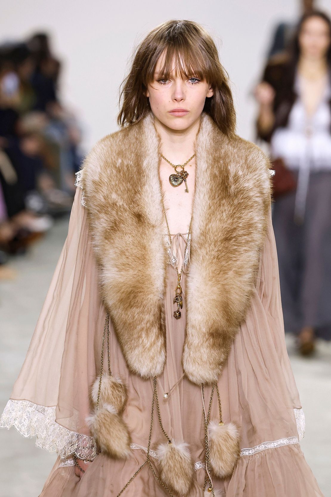 Lace and waifish chiffon was off-set with faux fur stoles.