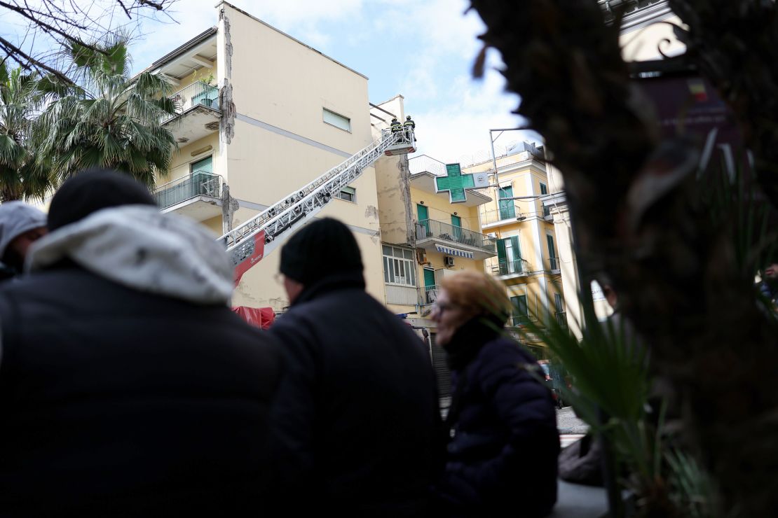 The fire brigade pictured attending a damaged building.