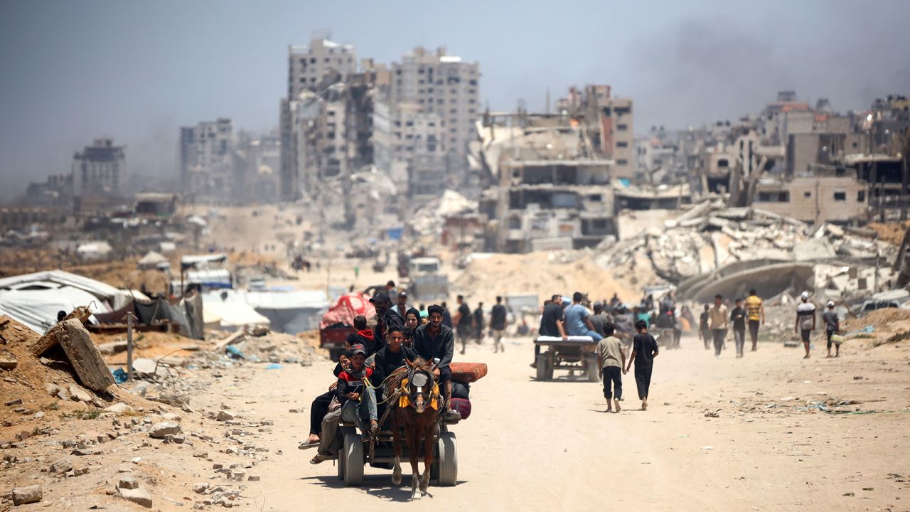 Mandatory Credit: Photo by Majdi Fathi/NurPhoto/Shutterstock (15319030h)
People commute along the al-Rashid road, the only route linking the northern and southern parts of the Palestinian territory, on May 25, 2025.
Hamas Israel Conflict, Gaza, Palestine - 25 May 2025