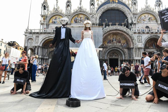Members of the climate activist group Extinction Rebellion protest in Venice's Piazza San Marco on Thursday.