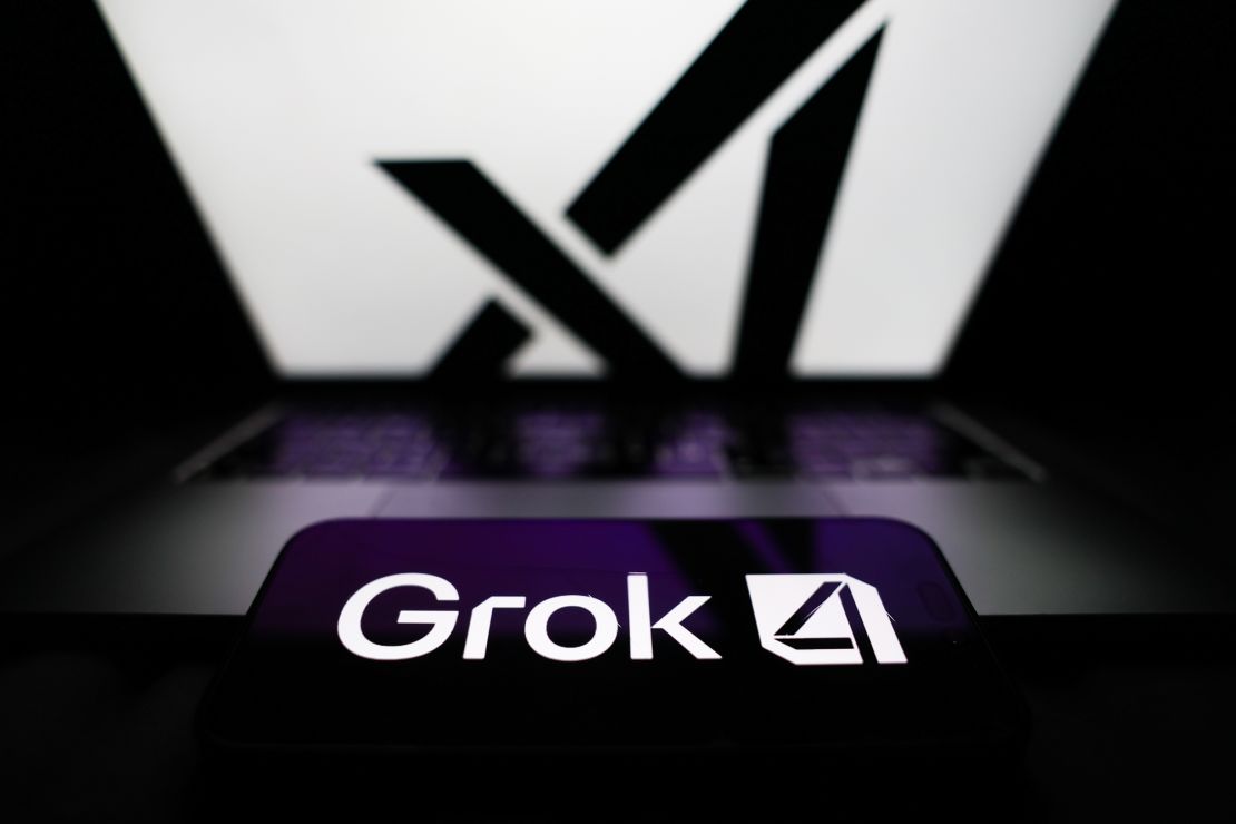 XAI logo displayed on a screen and Grok 4 logo displayed on a phone on July 12. CNN tested out Grok 4 several times over the course of last week.