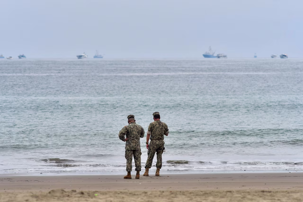 Members of the Ecuadorian Navy patrol El Murcielago beach in Manta, Ecuador, on Wednesday.