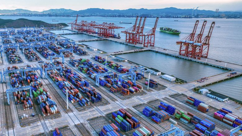 Cargo ships load and unload containers in an orderly manner at the berth, and unmanned trucks transport containers in Dapukou Container Terminal in Jintang Port Area, Zhoushan Port, Ningbo, Zhejiang, China, on September 9, 2025. Zhoushan Port Container Transportation, China - 09 Sep 2025
