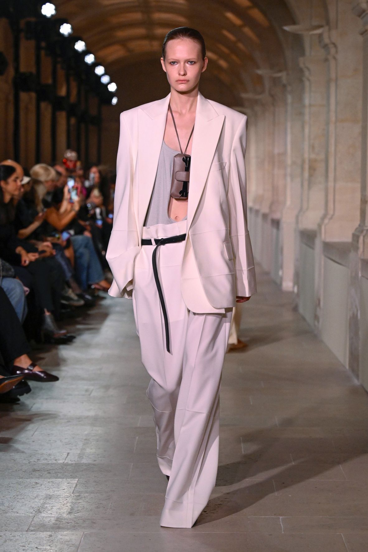 A sharp suit in pretty pink at Victoria Beckham's Spring-Summer 2026 show.