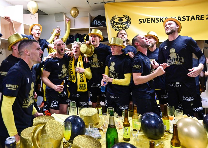 Mjällby's Jeppe Kjær Jensen celebrates in the locker room after the team secured the Swedish title thanks to a victory over IFK Göteborg away at Gamla Ullevi.