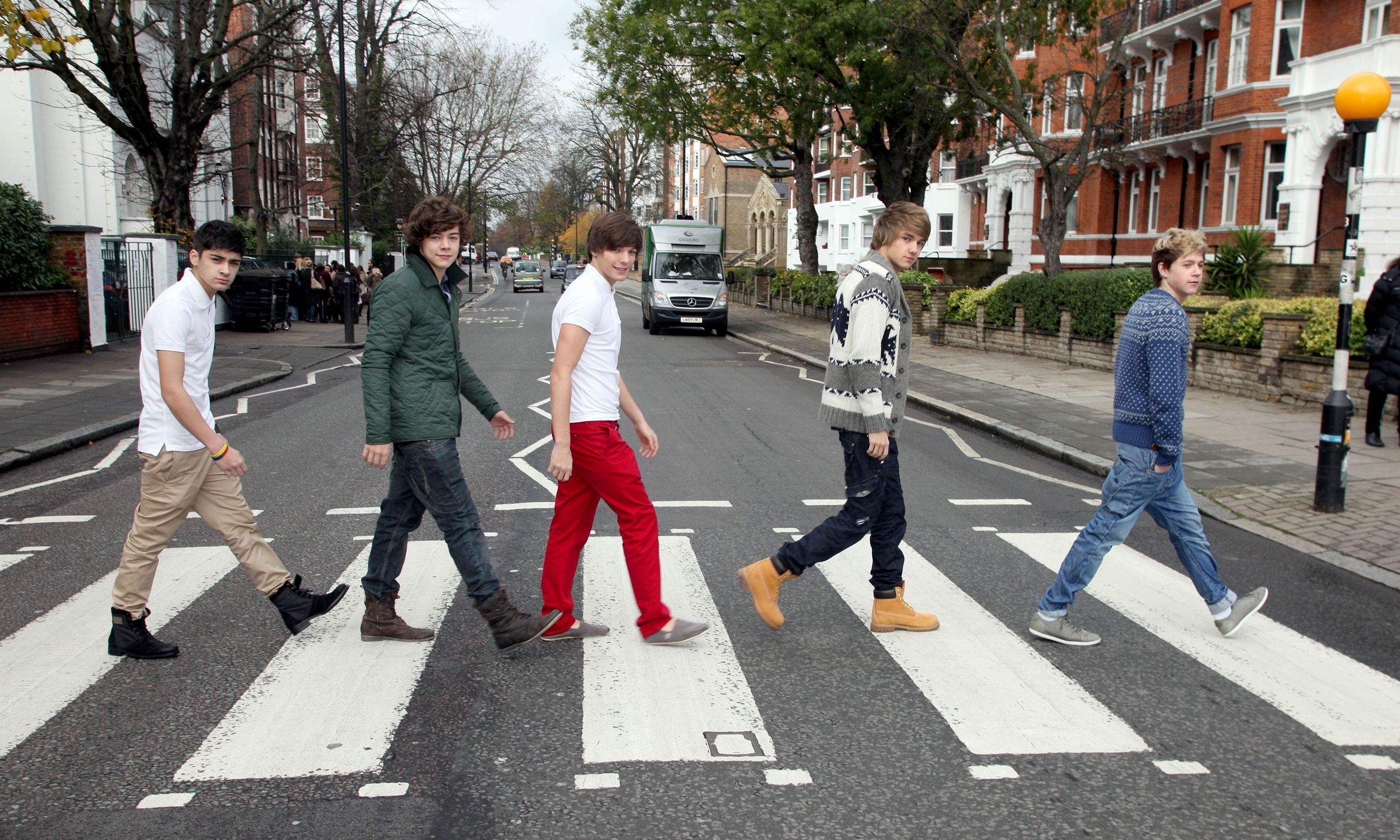 One Direction visits the location where The Beatles were photographed for their classic album "Abbey Road" in London in 2010.