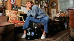 Jane Birkin with her original namesake bag. Sotheby's sold the luxury icon on Thursday.