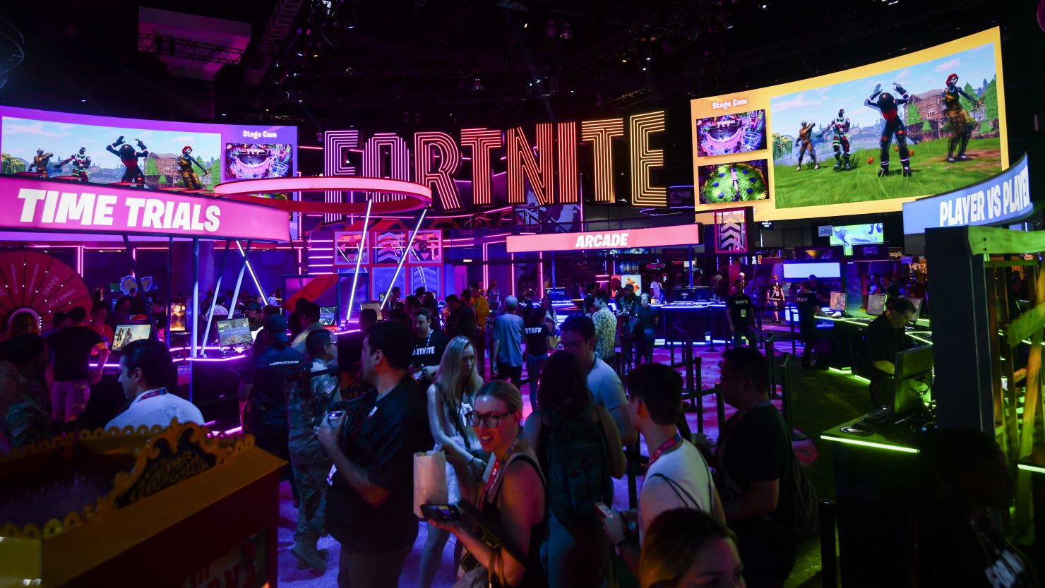 June 11, 2019; Los Angeles, CA, USA; E3 participants walk through the Fortnite section of the wing at E3.