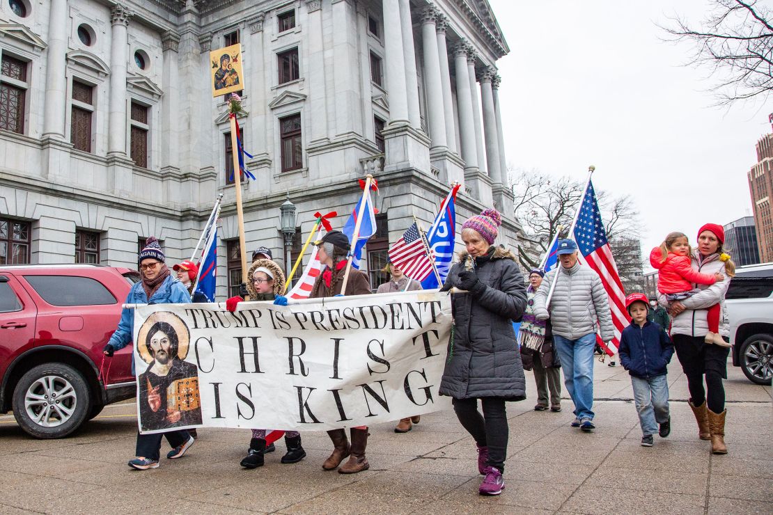 A group known as the Jericho Marchers walk during a rally to protest the 2020 presidential election results at the Pennsylvania State Capitol in Harrisburg, Pennsylvania, on January 5, 2021.