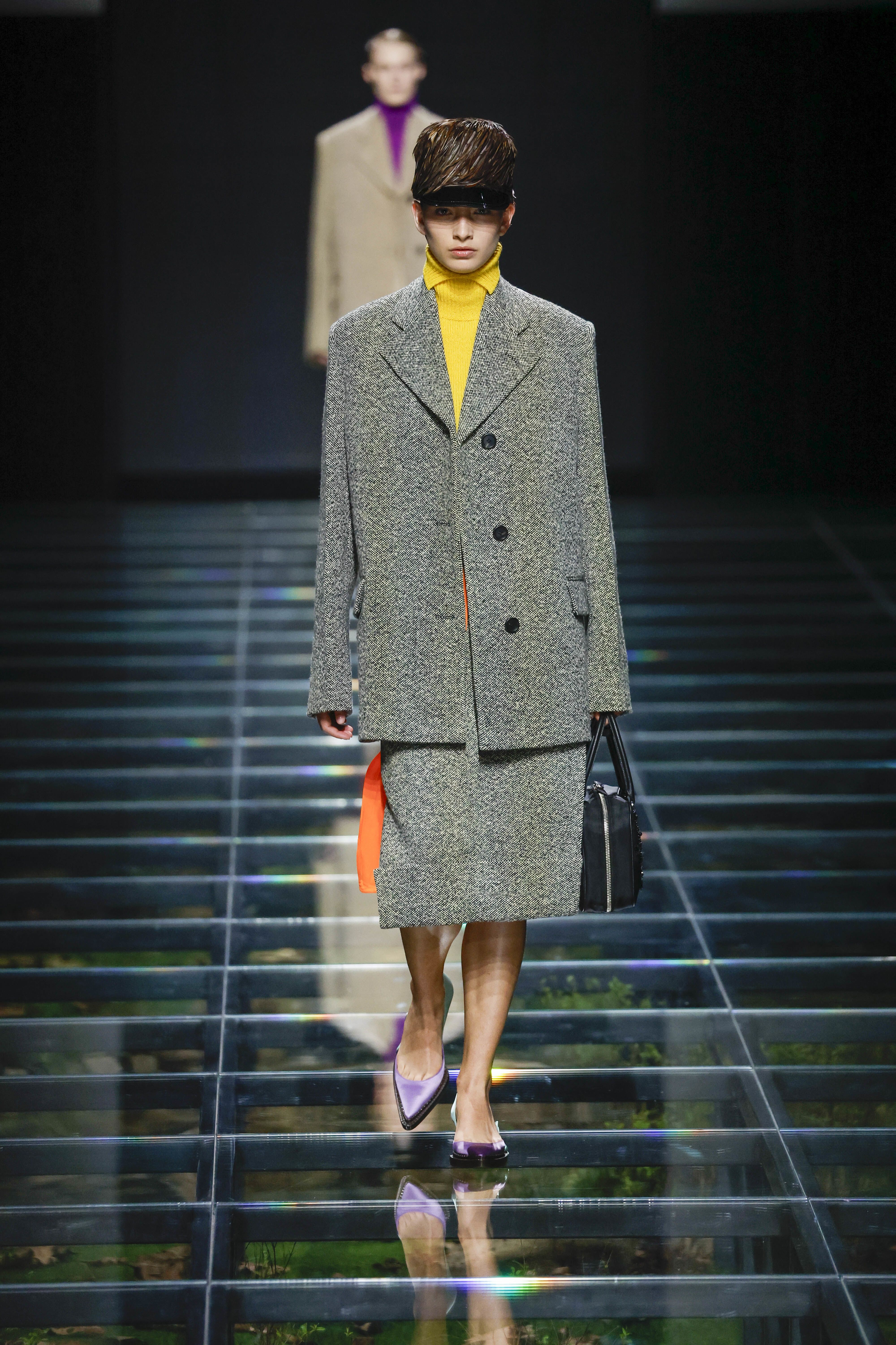 At Prada, what appeared to be a wool blazer at the front had a satin waistcoat back.
