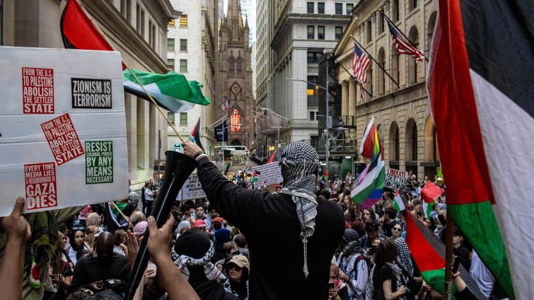 Demonstrators hold a rally in support of Palestine outside the Nova Music Festival Exhibition in New York City on June 10, 2024. The exhibition pays tribute to the victims of the October 7 attack by Hamas on an Israeli music festival.