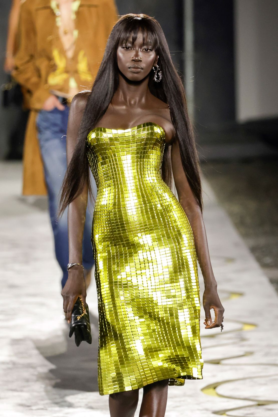 Donatella Versace reimagined the label's iconic metallic mesh dresses of the 1990s with 3D printing technology.