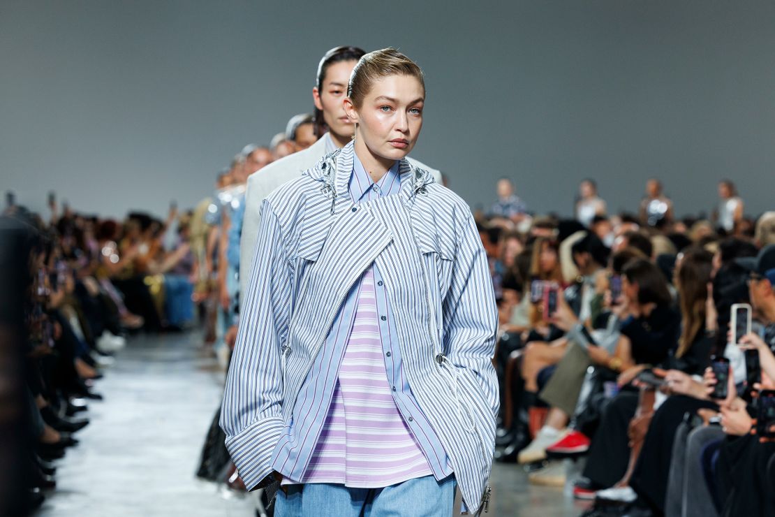 Gigi Hadid wears a deconstructed shirt at Rabanne.