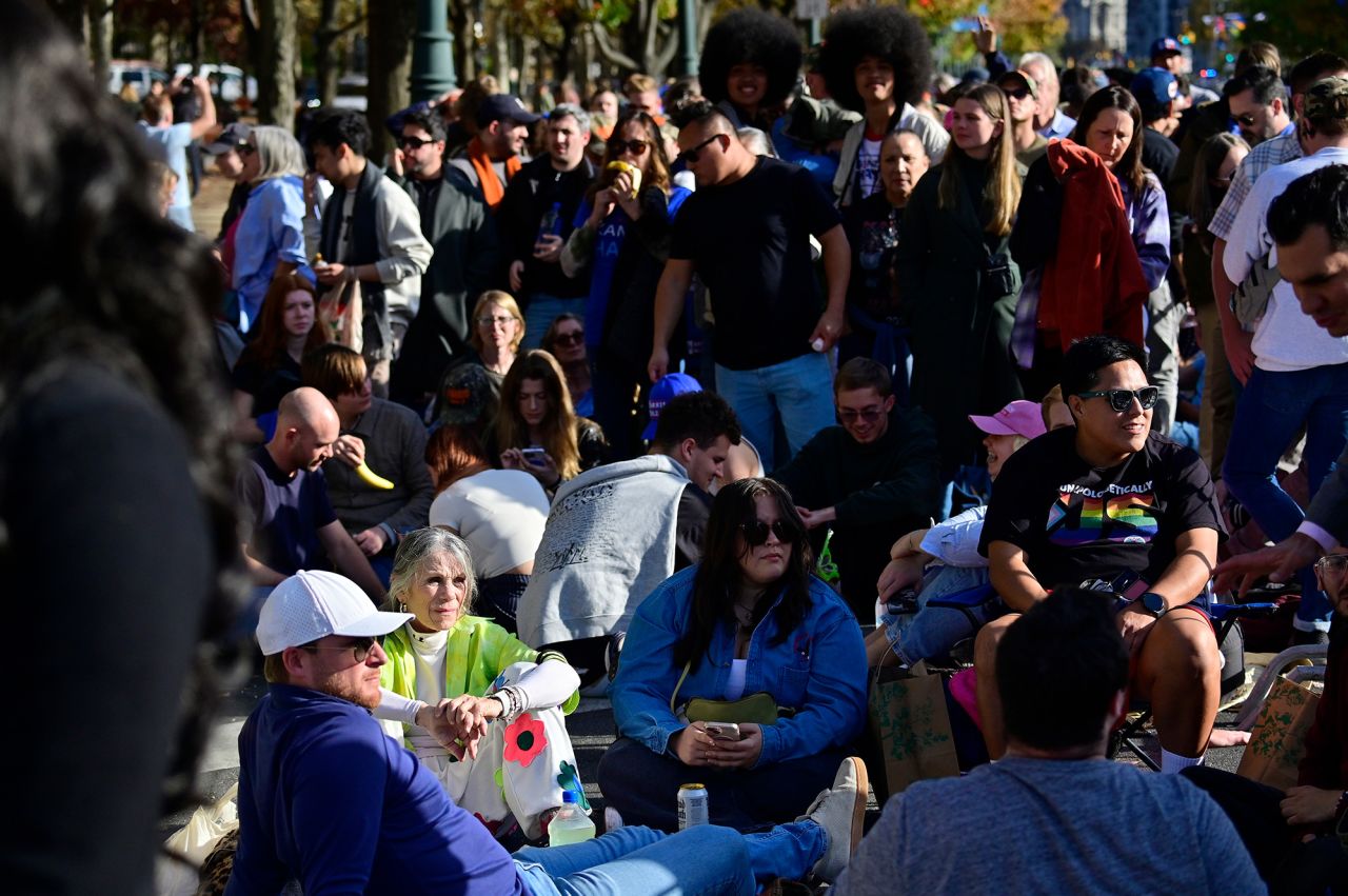 Hundreds of Harris supporters wait in line to attend the Harris-Walz Crossing Rally & Concert in Philadelphia, on Monday.