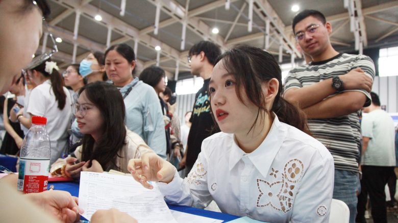 Job seekers look for opportunities at a job fair mostly for overseas returnees and PhD holders in Nanjing in east China's Jiangsu province on September 20, 2025.