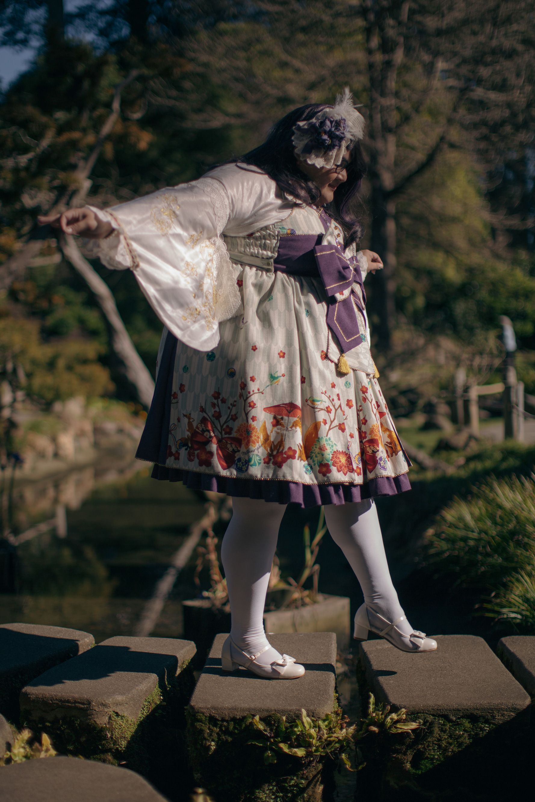 Bianca poses in a Wa (Kimono) style dress while at the Japanese Tea Garden in San Francisco, California, on Jan. 24, 2023. Lolita fashion encompasses a variety of aesthetics, including cute, gothic, classic, and sweet.
