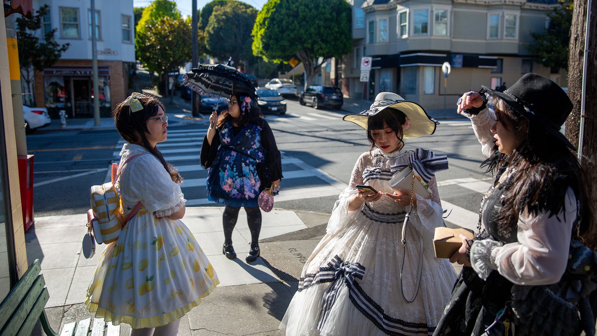 Lauren, Bianca, Nghi, and Ella wait outside the Lovejoy's Tea Room in San Francisco, California, on September 10, 2023.