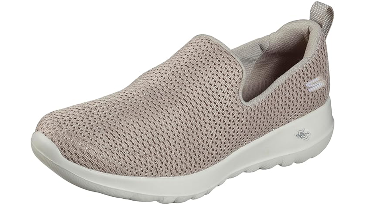 Skechers Women's Go Walk Joy Sneaker stock photo