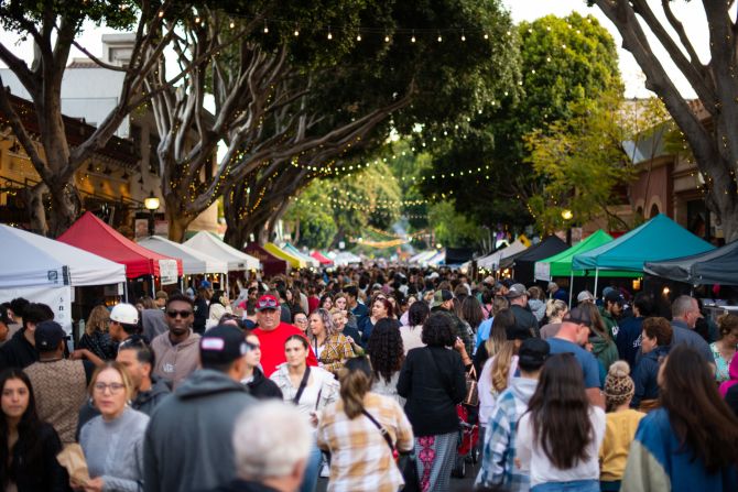 <strong>Farm-fresh food: </strong>SLO's weekly farmers' market is a popular gathering spot.