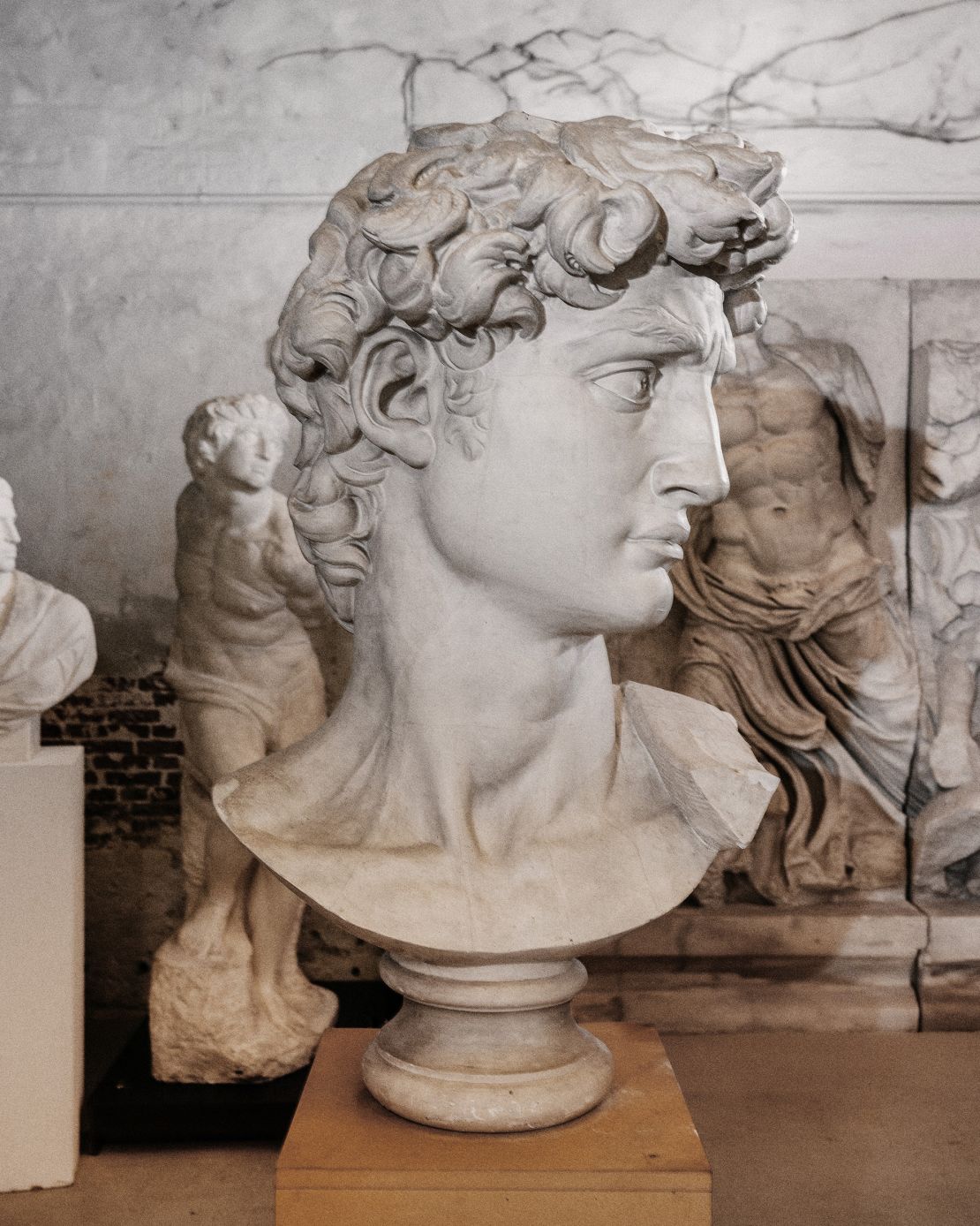A bust of “David,” cast in 1890 after nearly four centuries after the original was carved around 1501-04. It is one of the historical reproductions in the show, alongside a full-sized bronze version of David.