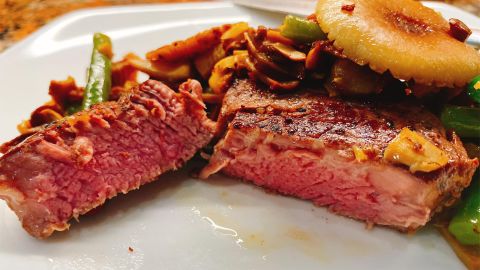 A classic sous-vide application is to cook a steak perfectly in the immersion bath, and then finish it in a pan to give it a crust.