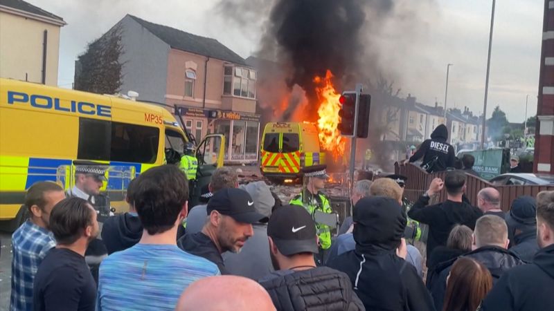 Video: Vigil for children killed in Southport, UK, ‘hijacked’ by rioters | CNN