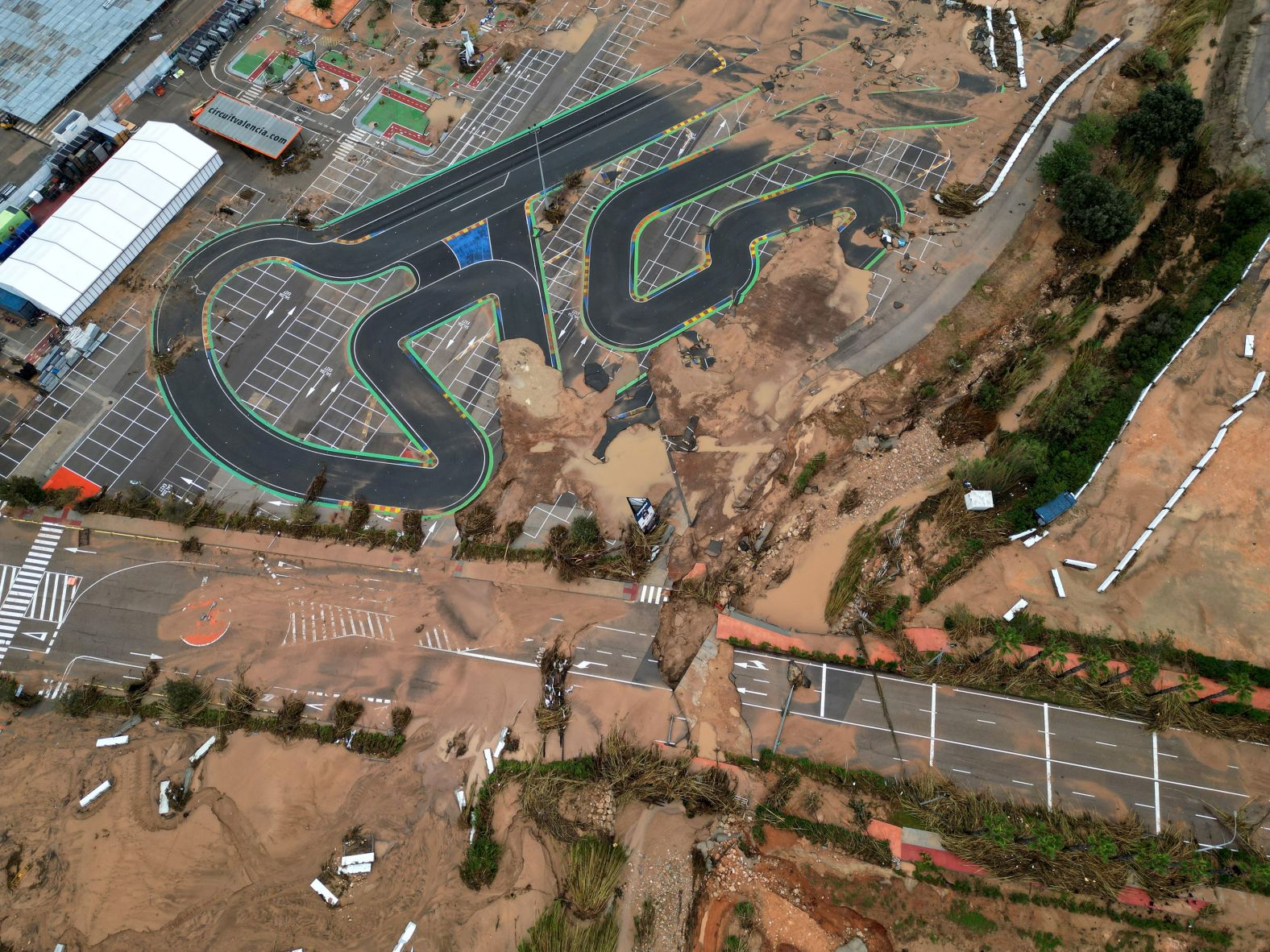 An aerial image shows damage to the Circuit Ricardo Tormo on Monday after the Valencia Grand Prix was canceled.