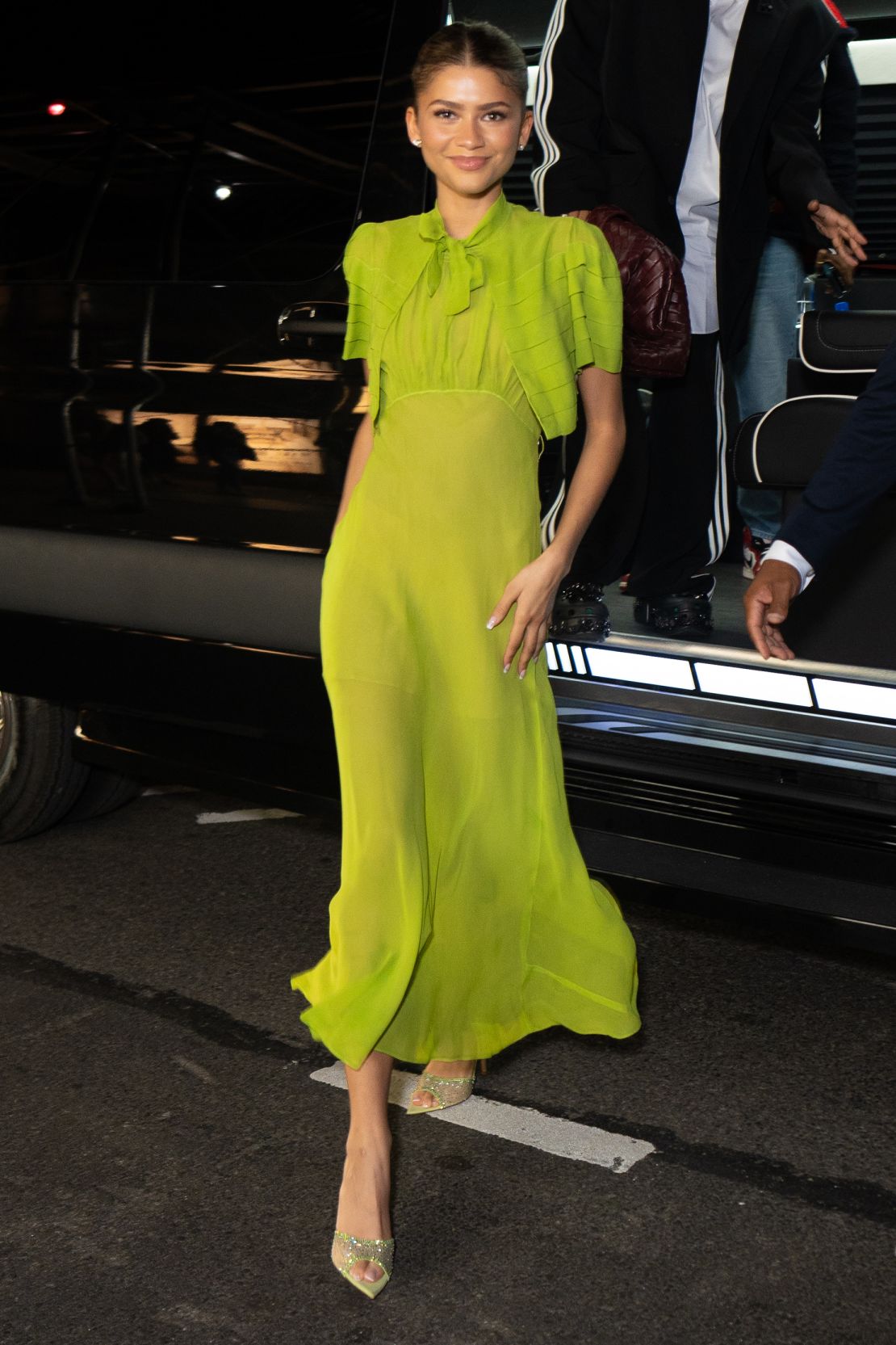 On April 24, the actor stepped out in a twee silk chiffon dress — a vintage piece nearly a century old, "<a href="https://www.vogue.com/article/zendaya-challengers-look-nearly-100-years-old" target="_blank">Vogue" reported</a> — and matching cropped jacket in the acid green (read: tennis ball) hue that had repeated throughout the "Challengers" press tour.