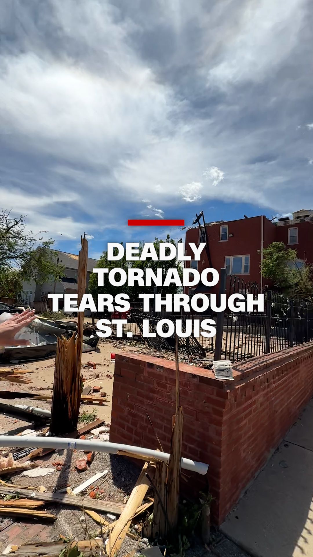 A storm that produced a devastating tornado in the St. Louis, Missouri,area Friday afternoon has left at least five people dead and at least 10 injured, according to local authorities. CNN’s Julia Vargas Jones walks through some of the aftermath where a floor to one building was blown away.