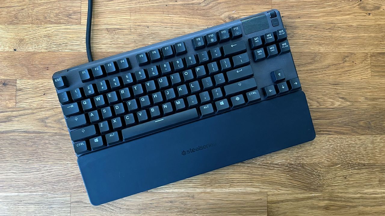 The SteelSeries Apex Pro mechanical keyboard, shown with its integrated wrist rest.