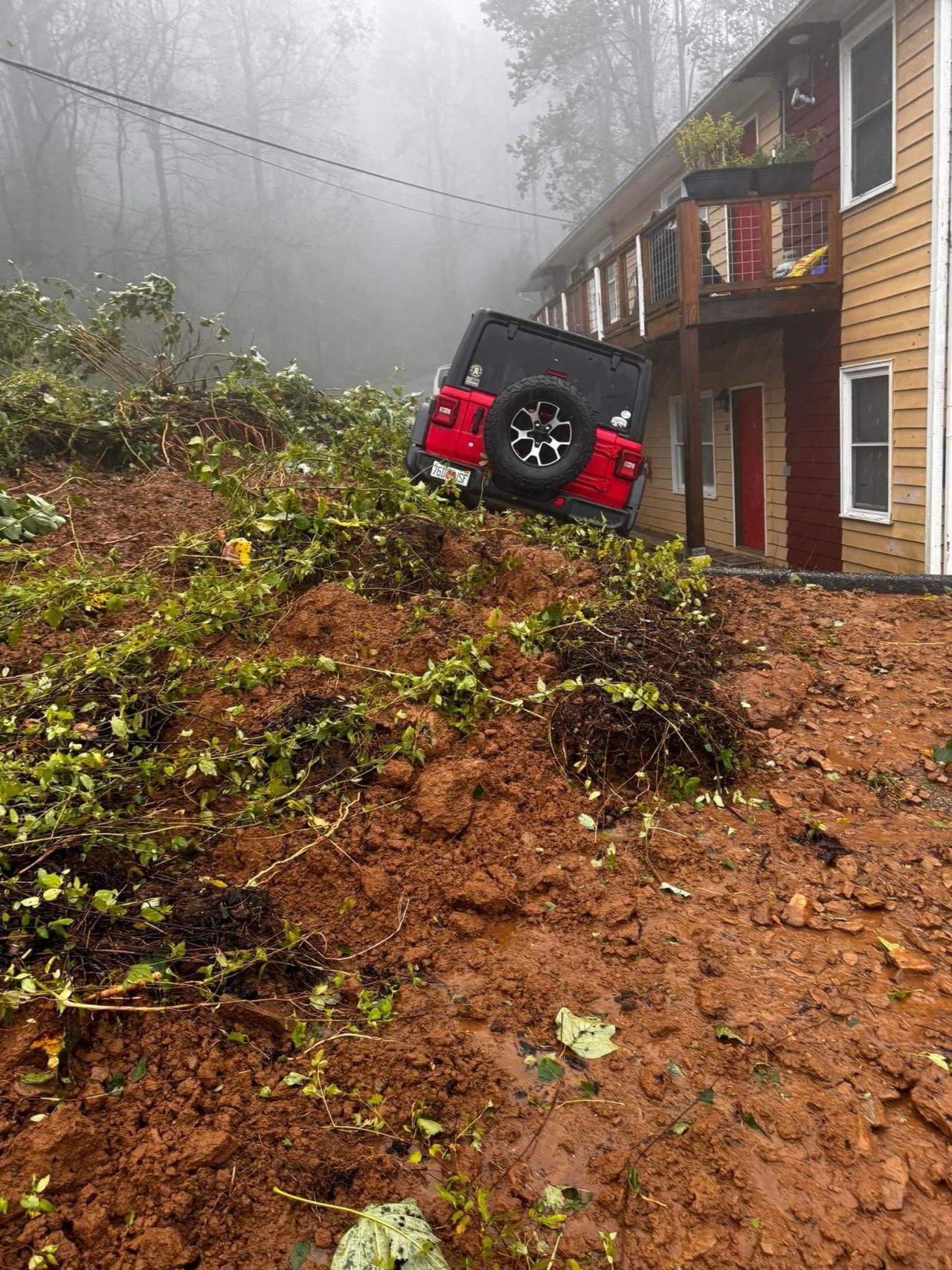 Stefanie’s Jeep was stuck after a landslide. Location: Little Switzerland, North Carolina