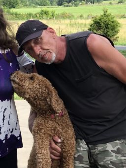 Steven and his dog, Orion.