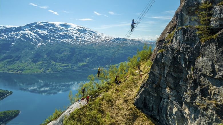 'Stigull,' a 40-meter-long ladder stretching 790 meters above a fjord in the Norwegian village of Loen opened on May 31 and is the latest addition to the popular Via Ferrata Loen.