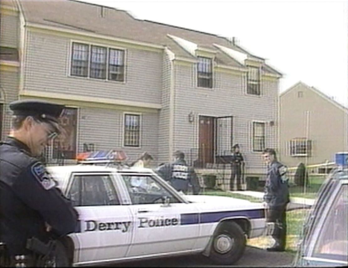 Police are seen outside of Pamela Smart's home in March 1991.