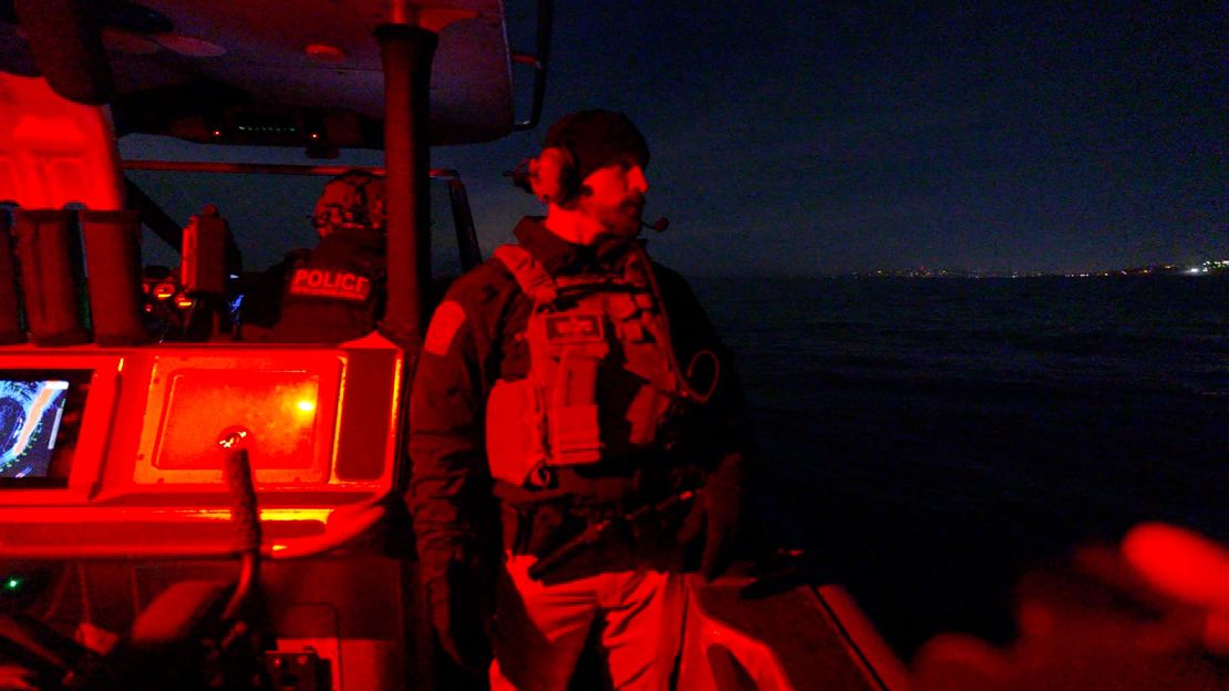 Kurt Nagel of CBP's Air and Marine Operations scans the ocean for anything suspicious.