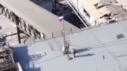 The Russian flag is raised in Avdiivka, Ukraine, in this video screengrab shared by the Ambassador at Large of the Russian Ministry of Foreign Affairs on February 17, 2024.