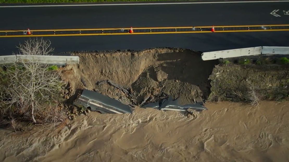 An aerial view from affiliate KGO shows a portion of California state route 84 cracked and slipping into Alameda Creek on Monday morning.