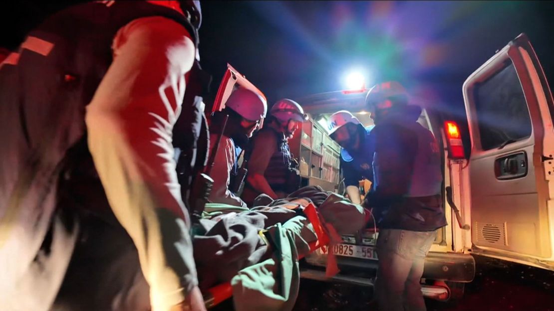 A patient is loaded into a Palestine Red Crescent Society ambulance at Nasser hospital in Khan Younis, Gaza, on February 19, 2024.
