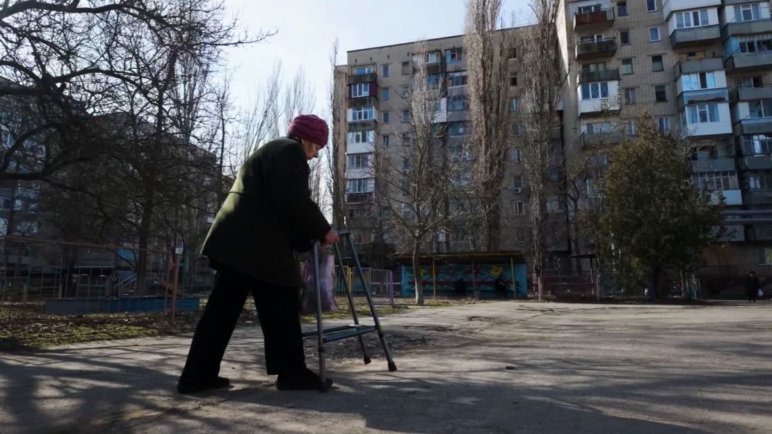 Sophia walks through Kherson.