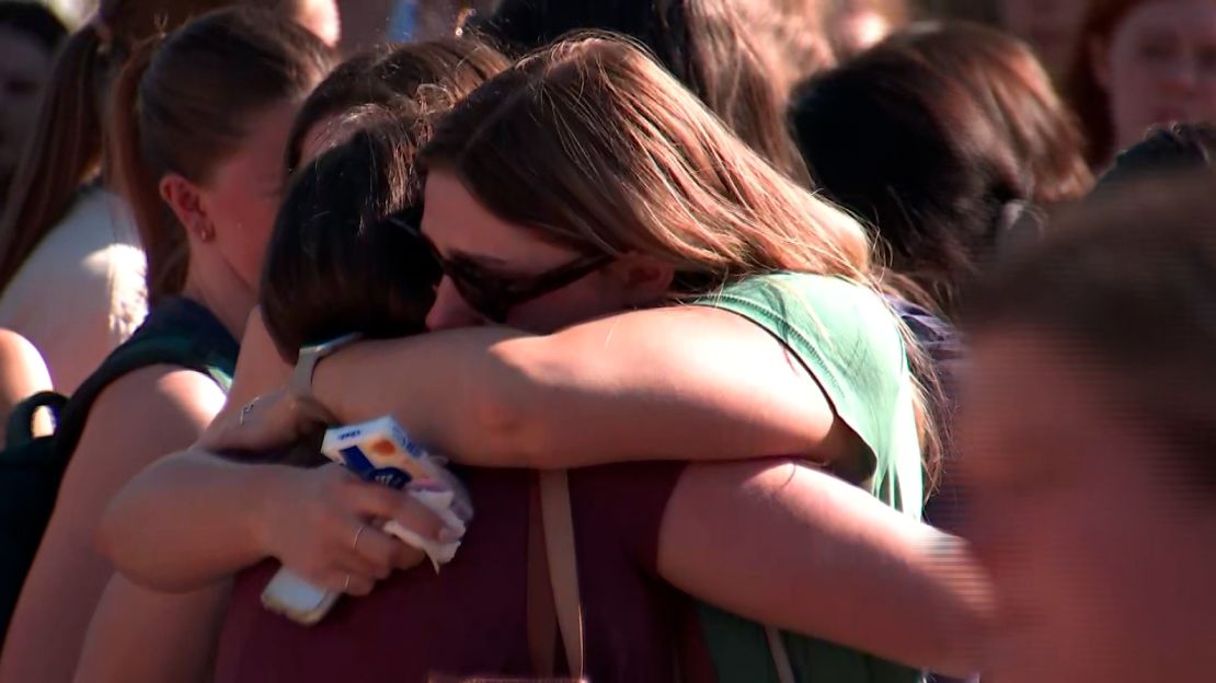 Mourners grieve the death of Laken Riley at a vigil on the University of Georgia campus on February 26.