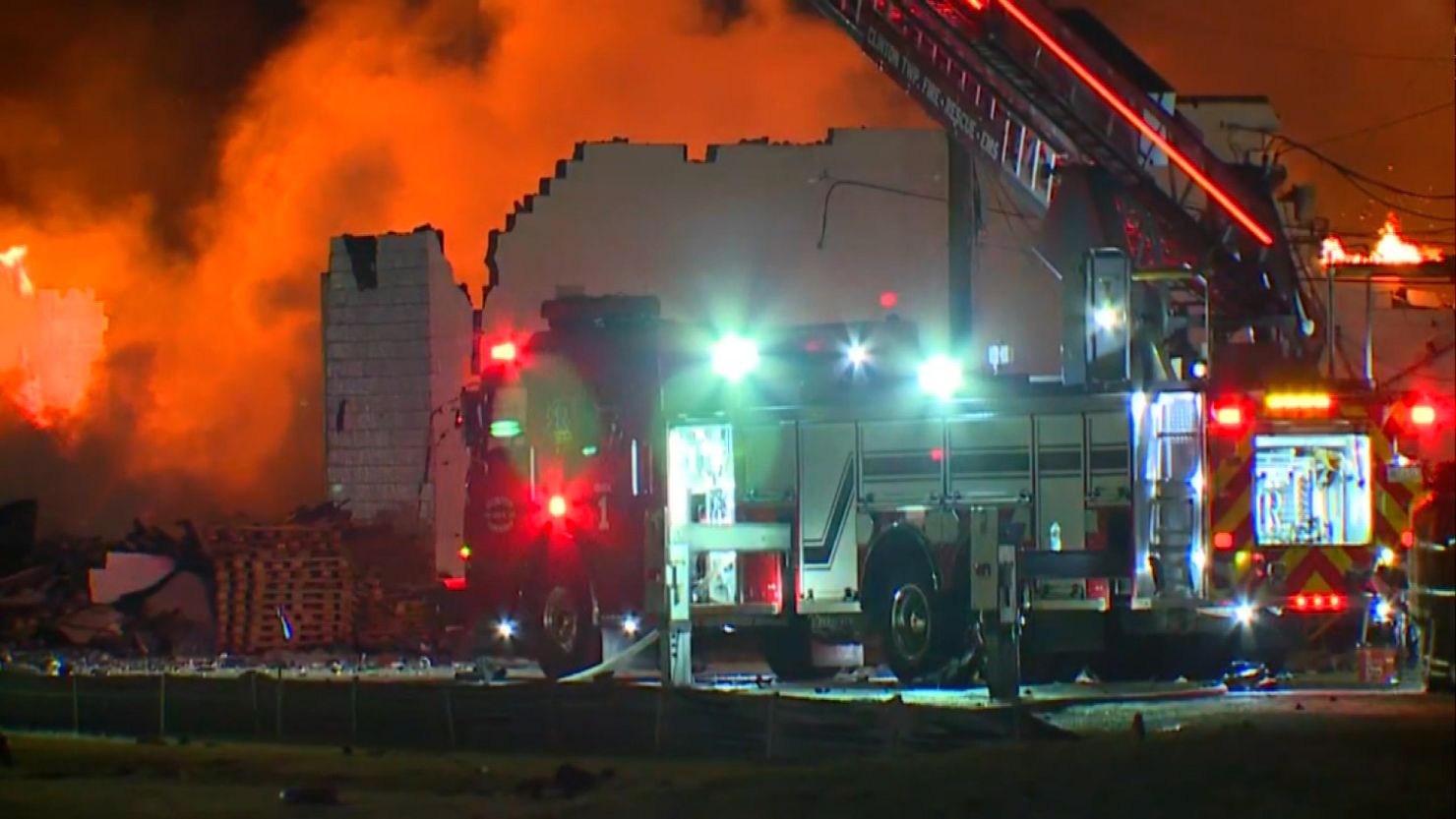 First responders battle a dangerous blaze in Clinton Township, Michigan, Monday night.