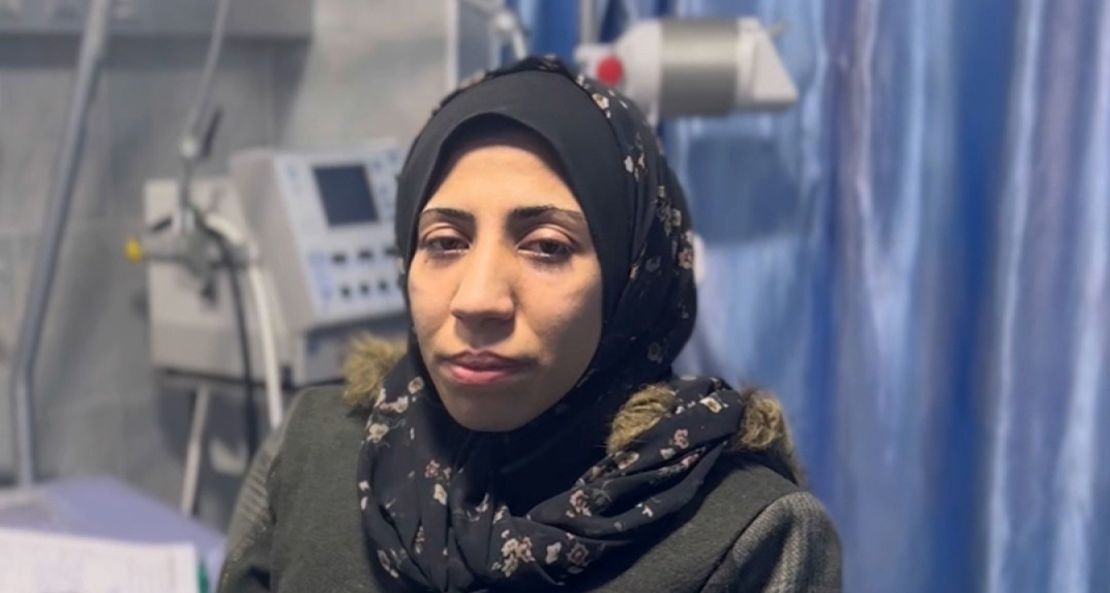 Anwar Abdul Nabi, a young mother whose 3-year-old daughter, Mila, had died of malnutrition minutes earlier. Israel's siege on Gaza has consigned Palestinians in the enclave to deadly starvation.