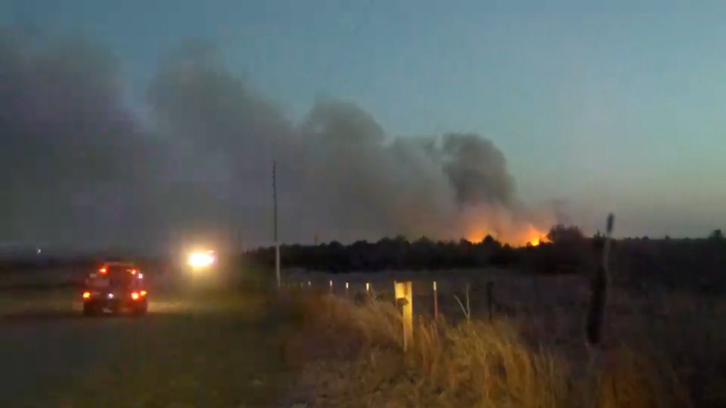 A still from a video of wildfires with heavy smoke moving through Woodward County, Oklahoma, during severe weather there.