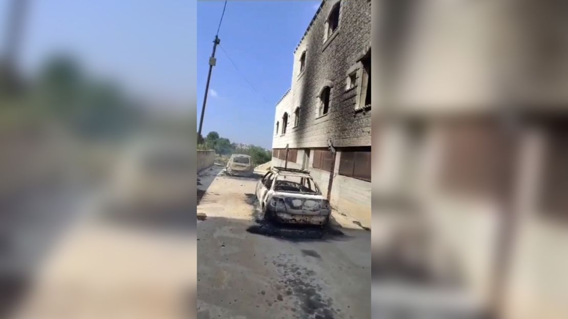 A screen grab from video obtained by CNN shows cars in the village of Duma in the West Bank on April 13.