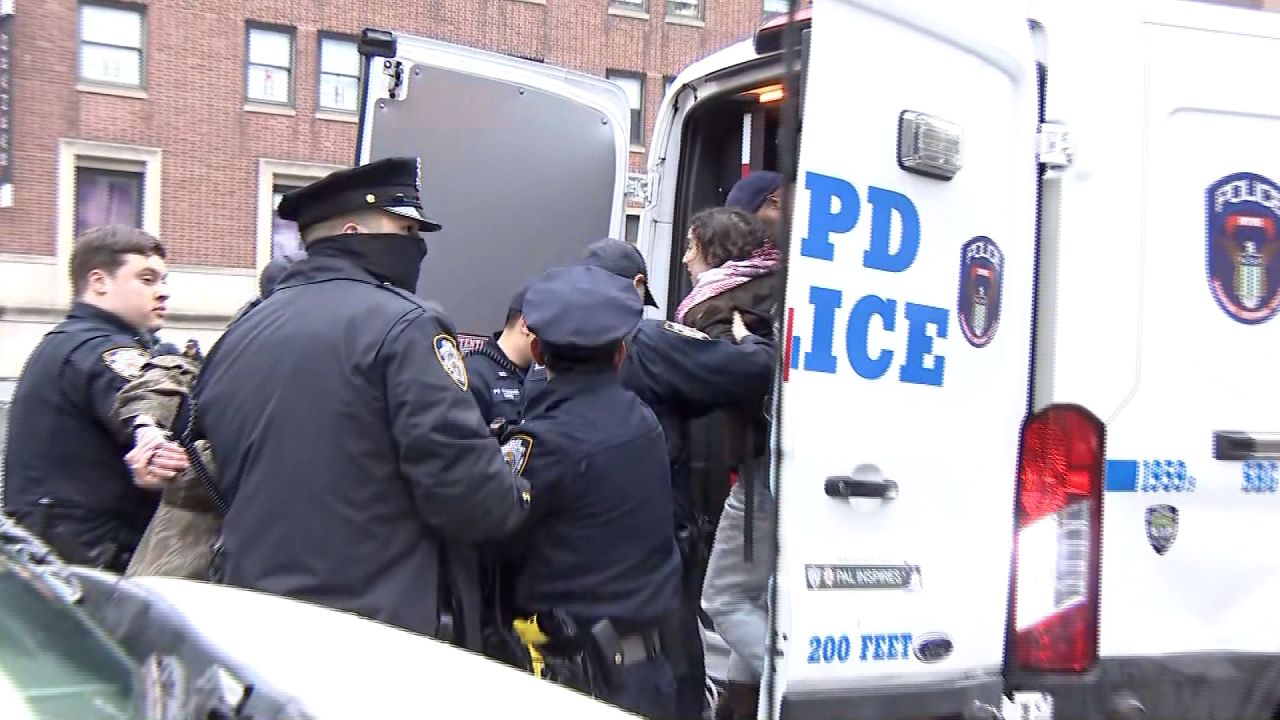 Protestors are detained during a protest at Columbia University on April 18, 2024.